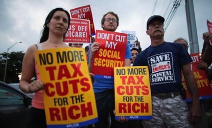 Protesters rally outside the office of Sen. Marco Rubio (R-Fla.) on Dec. 10, hoping that senators like Rubio don't cut benefits like Medicare in fiscal-cliff talks.