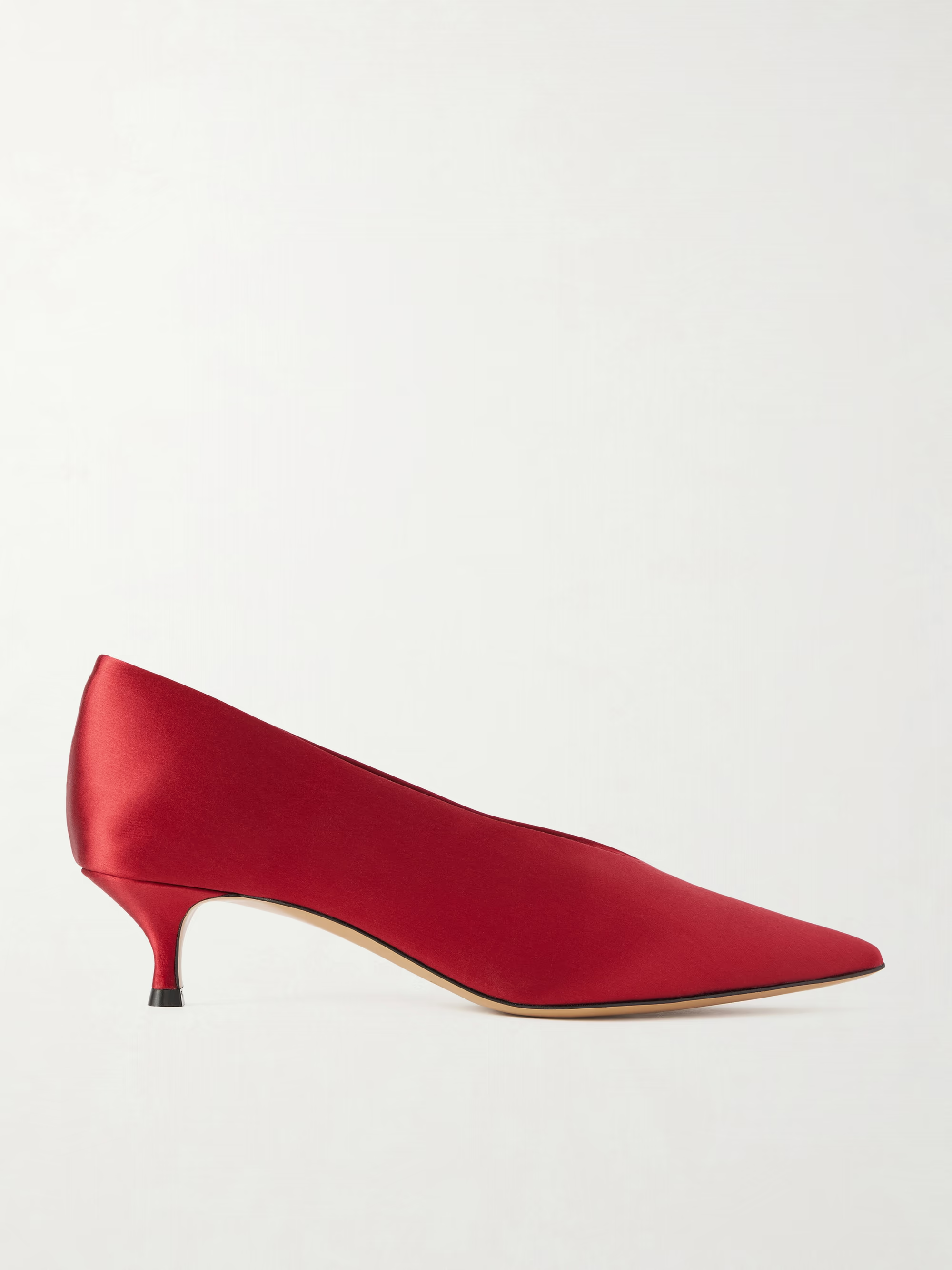 A pair of red satin kitten heel shoes.