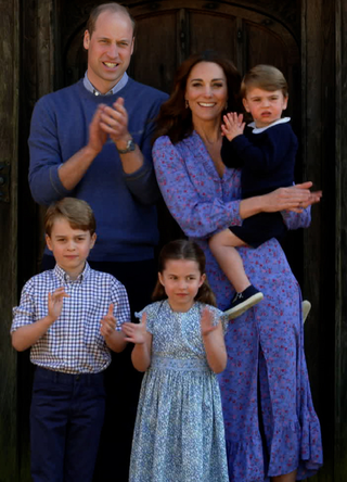 In this screengrab, Prince William, Duke of Cambridge, Catherine Duchess of Cambridge, Prince George of Cambridge, Princess Charlotte of Cambridge and Prince Louis of Cambridge clap for NHS carers as part of the BBC Children In Need and Comic Relief 'Big Night In at London on April 23, 2020 in London, England