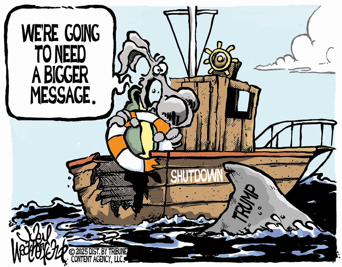 This cartoon is a takeoff on the film “Jaws”. A donkey is on a boat named “Shutdown.” A shark labeled “Trump” has just bitten off a chunk of the boat and swims away. The donkey says, “We’re going to need a bigger message.”