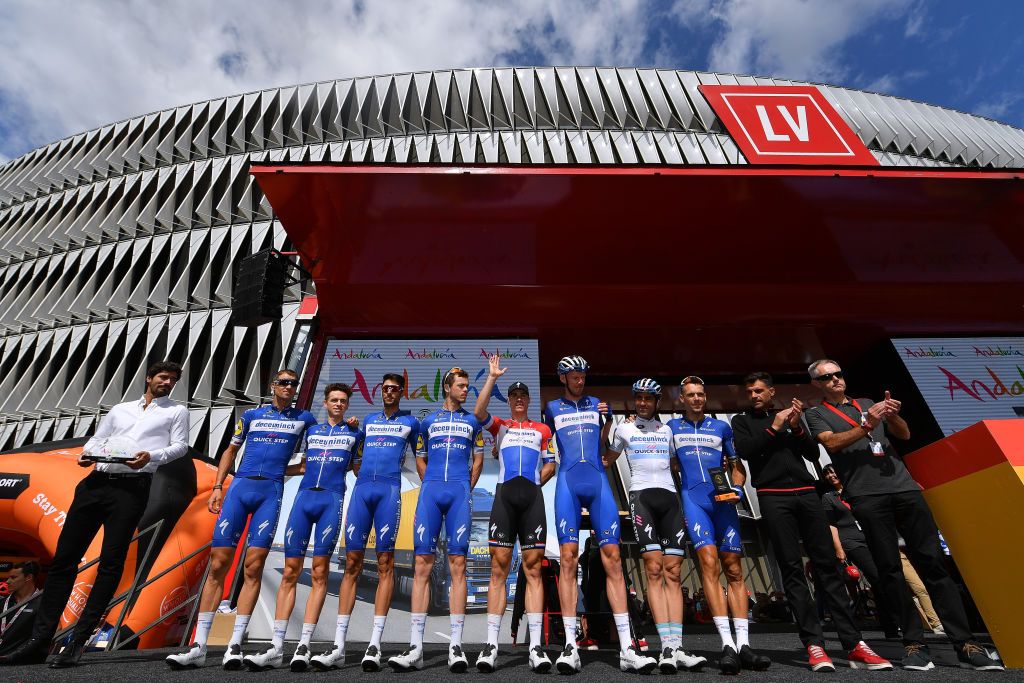 Deceuninck-QuickStep at the stage 13 start outside Athletic Club's San Mam&eacute;s stadium in Bilbao