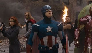 The Avengers Chris Evans stands in the center of the circle