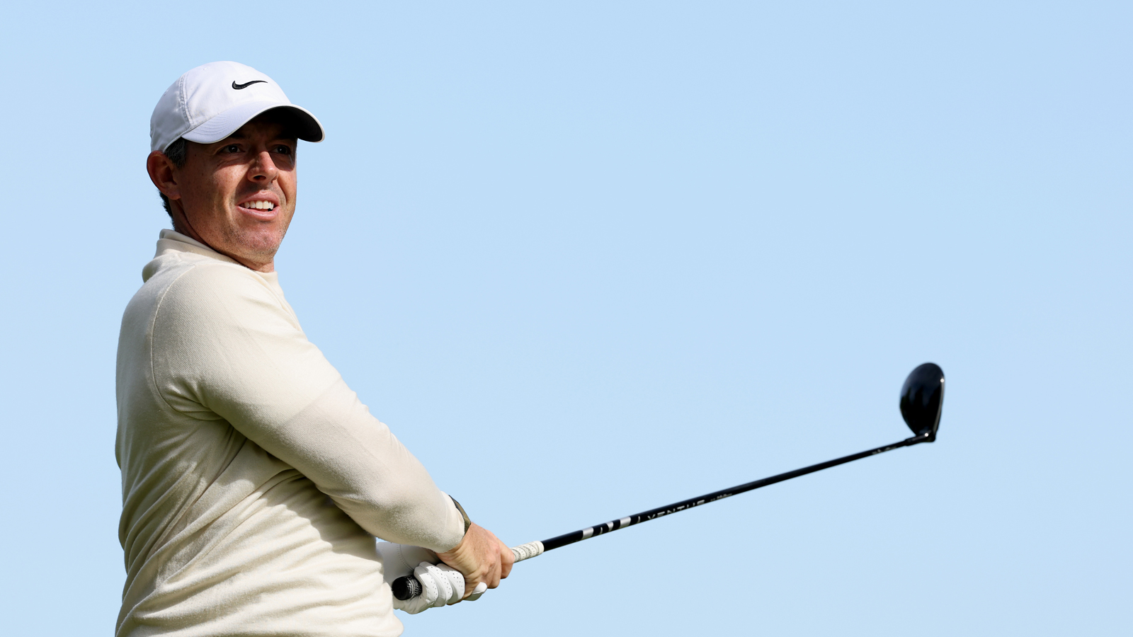 Rory McIlroy hits a 3-wood off the tee