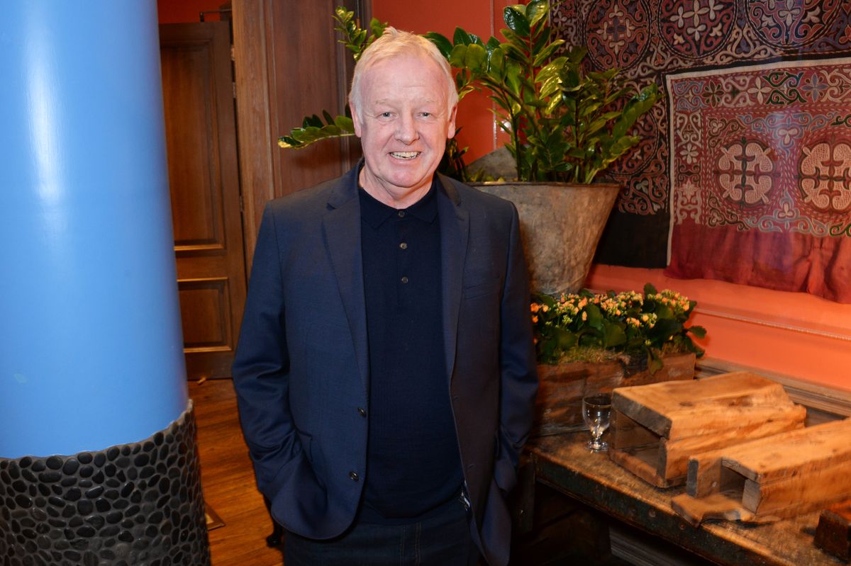 Les Dennis attending an event