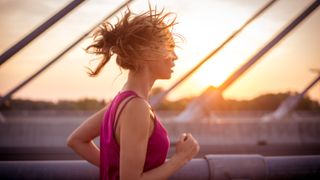 Best time to workout: Image shows woman running early in the morning