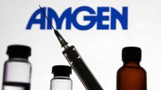 Amgen logo with bottles and needle in forefront