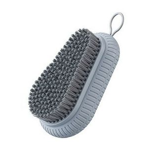 A grey-handled plastic scrubbing brush with dark grey bristles