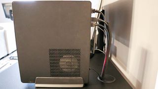 Vari Curve Electric Standing Desk grommets with desktop
