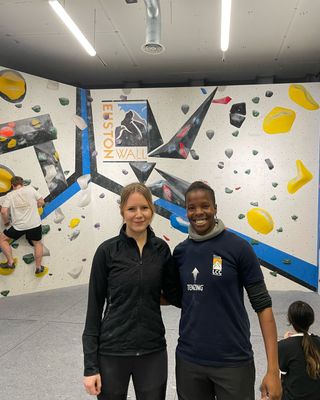 Bouldering for beginners: Liz and her coach during her induction session