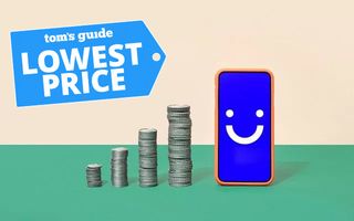 Phone with Visible logo and coins stacked nearby showing savings.