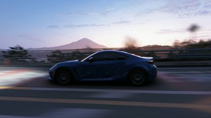 Forza Horizon 6 2022 Toyota GR86 dirving down Hakone Nanamagari at dusk with Mt Fuji in the background