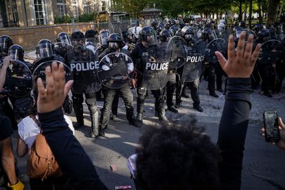 Protesters face police in Washington D.C.