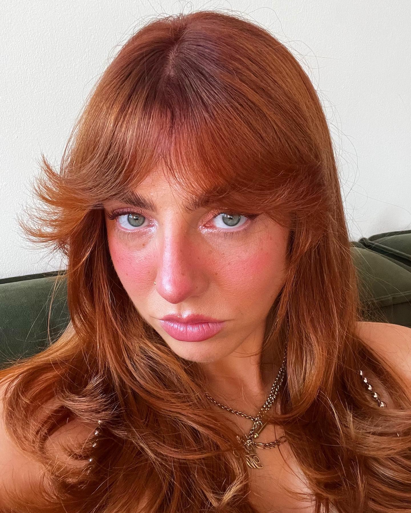 Laura Elizabeth Klien wearing pink eyeshadow, blush, and lipstick