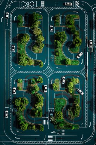 An aerial shot of cars around a busy junction