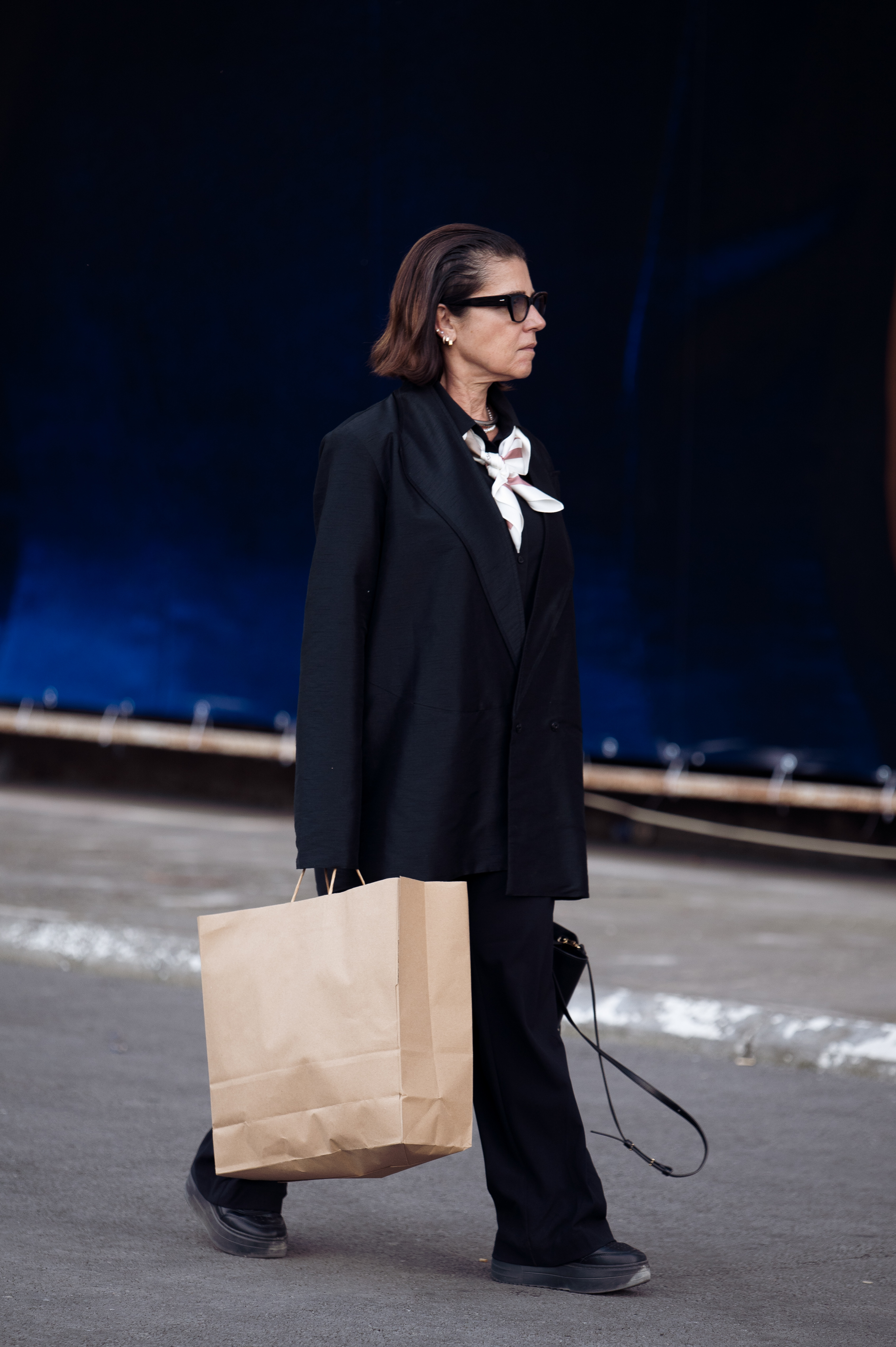 Photos of women wearing flatform platform sneakers.