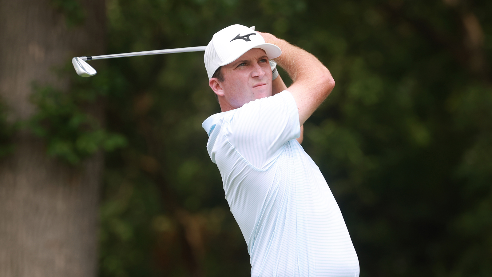 Steven Fisk hits an iron shot