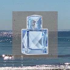Khlo&eacute; Kardashian XO Blue Eau de Parfum against an ocean background