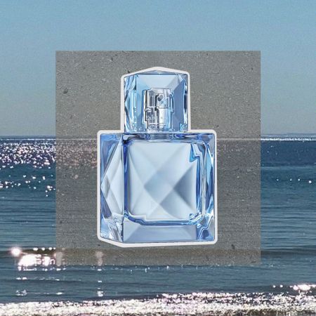 Khlo&eacute; Kardashian XO Blue Eau de Parfum against an ocean background