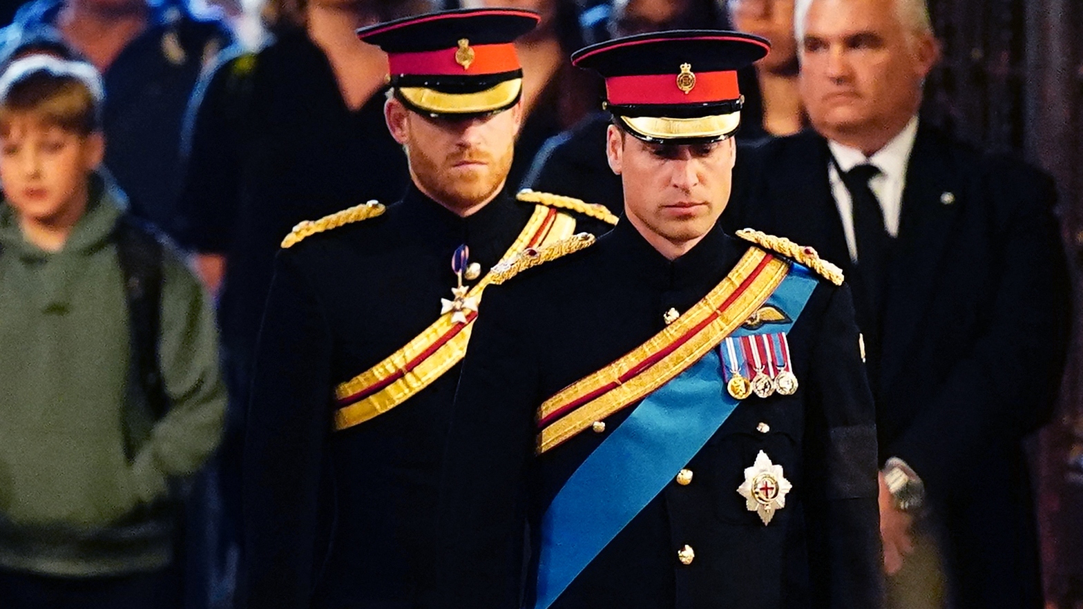 Prince Harry, Duke of Sussex and Prince William, Prince of Wales arrive to hold a vigil around the coffin of Queen Elizabeth II, in Westminster Hall