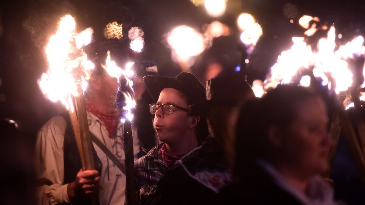 Thousands of spectators crowd into the small market town, whose usual population is 16,000, to see the processions.