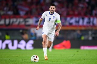 Serbia Euro 2024 squad Aleksandar Mitrovic of Serbia runs with ball during the international friendly match between Austria and Serbia at Ernst Happel Stadion on June 04, 2024 in Vienna, Austria. (Photo by Christian Bruna/Getty Images)