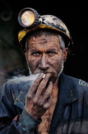 ’Smoking Coal Miner’, Pol-e-Khomri, Afghanistan, by Steve McCurry, 2002.