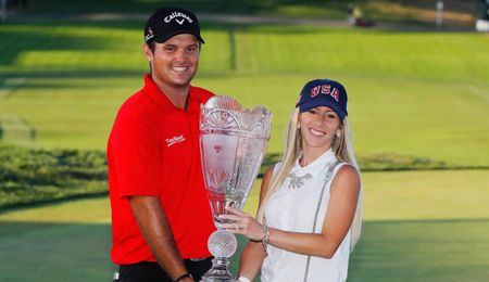 Patrick and Justine hold the trophy