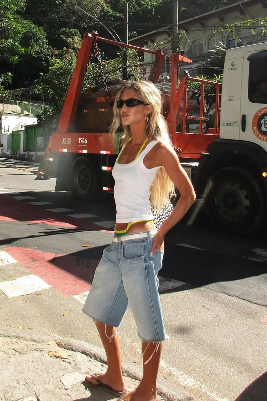 women wearing denim bermuda shorts