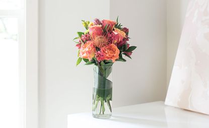 The birthday bouquet with glass vase