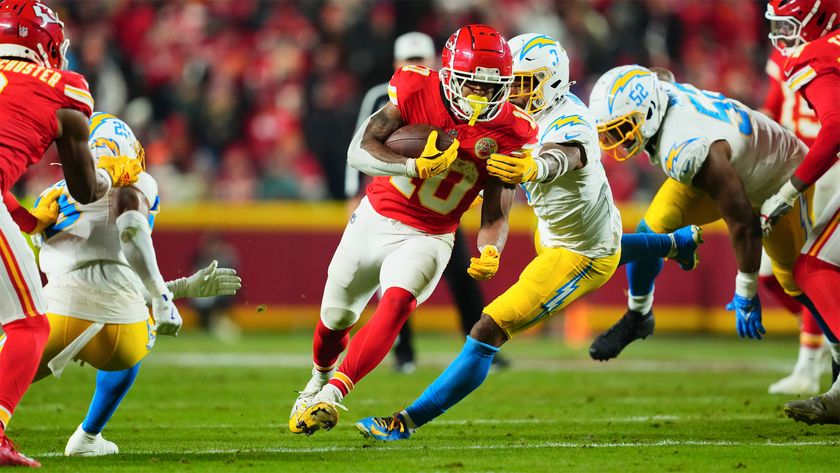 Isiah Pacheco of the Kansas City Chiefs runs with the ball against the Los Angeles Chargers during a December 2024 NFL game