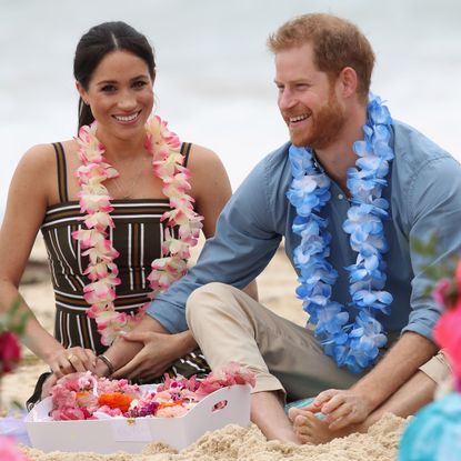 Prince Harry, Duke of Sussex and Meghan, Duchess of Sussex talk to members of OneWave, an awareness group for mental health and wellbeing at South Bondi Beach on October 19, 2018 in Sydney, Australia. The Duke and Duchess of Sussex are on their official 16-day Autumn tour visiting cities in Australia, Fiji, Tonga and New Zealand.
