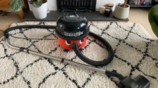 Henry Xtra HVX200-11 vacuum cleaner on a Berber-style rug in a Victorian living room