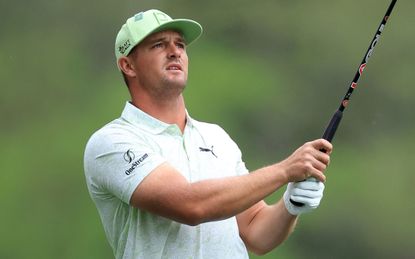 Bryson DeChambeau hits a golf shot