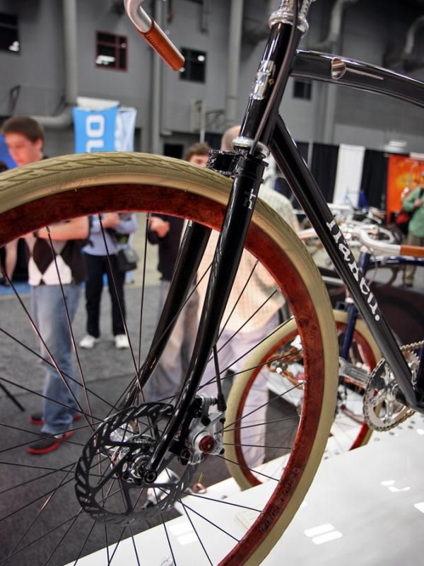 The front brake line is neatly run through the fork blade on Naked's Baby Ganoush.