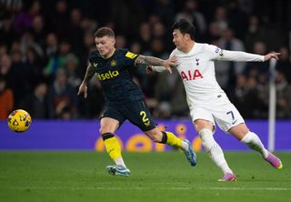 Kieran Trippier of Newcastle United (left) and Heung-Min Son of Tottenham Hotspur during the Premier League match between Tottenham Hotspur and Newcastle United at Tottenham Hotspur Stadium on December 10, 2023 in London, England. (Photo by Visionhaus/Getty Images)