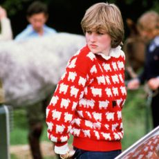 Princess Diana wearing her red sheep sweater