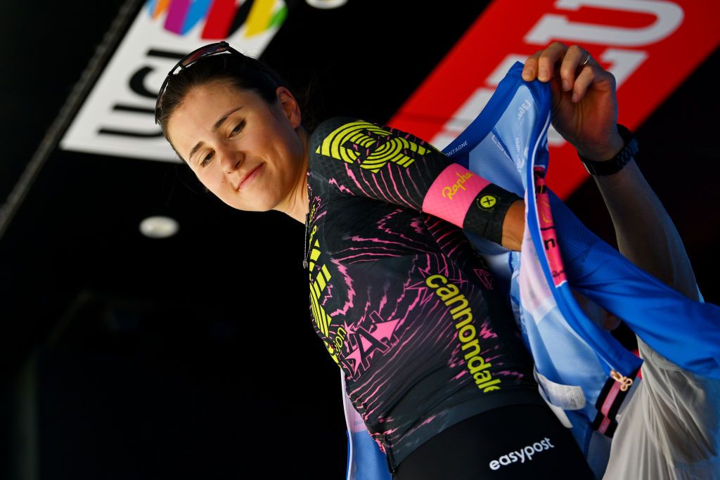 FOLIGNO ITALY JULY 11 Clara Emond of Canada and Team EF EducationCannondale Blue Mountain Jersey celebrates at podium during the 35th Giro dItalia Women 2024 Stage 5 a 108km stage from Frontone to Foligno UCIWWT on July 11 2024 in Foligno Italy Photo by Luc ClaessenGetty Images