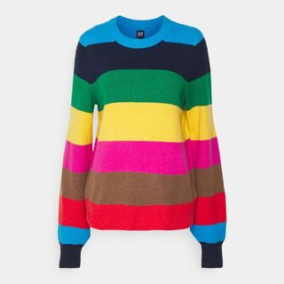 flat lay of gap rainbow stripe knitted sweater