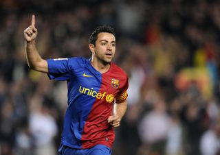 Xavi celebrates a goal for Barcelona against Malaga in March 2009.