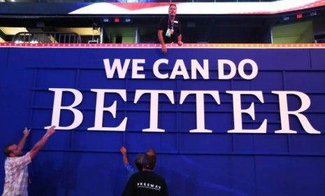 Workers hang a campaign sign that reads &amp;quot;We Can Do Better&amp;quot; ahead of the Republican National Convention at the Tampa Bay Times Forum: Mitt Romney, the presumptive GOP nominee will have to worr