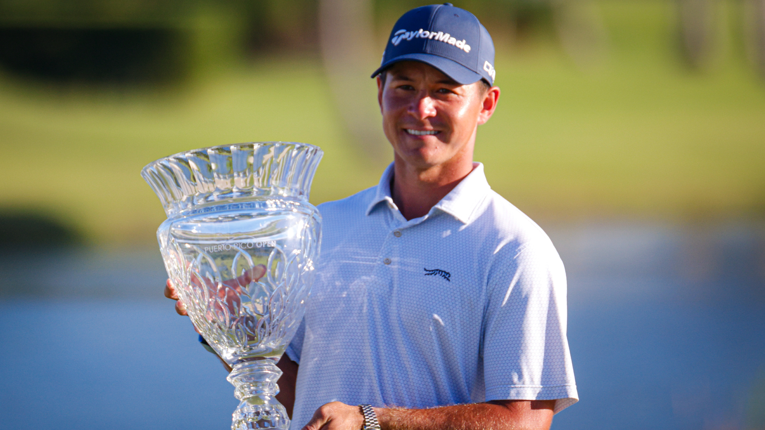 Karl Vilips with the Puerto Rico Open trophy