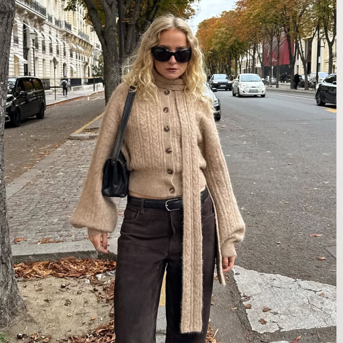 Influencer Fanny wearing scarf cardigan.