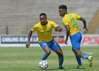 Lebohang Maboe on the ball ahead of teammate Themba Zwane