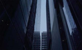 View of sky between two tall buildings
