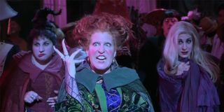 The Sanderson Sisters putting a spell on the parents of Salem