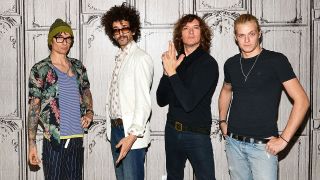 The Darkness in their most recent line-up. L-R: Justin Hawkins, Frankie Poullain, Dan Hawkins and Rufus Taylor