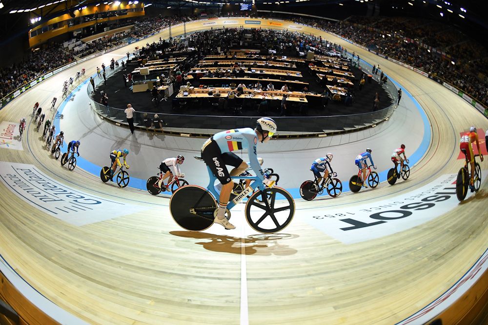 Cyclists take part in the men's Scratch final during the UCI Track Cycling World Championships in Apeldoorn