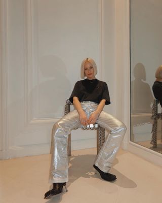 Silver trousers with black top outfit