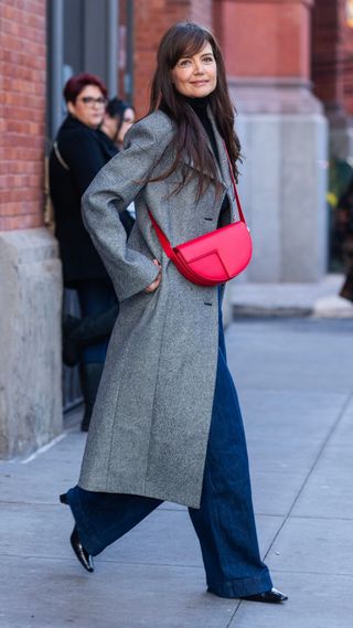 katie holmes wearing a cherry red bag