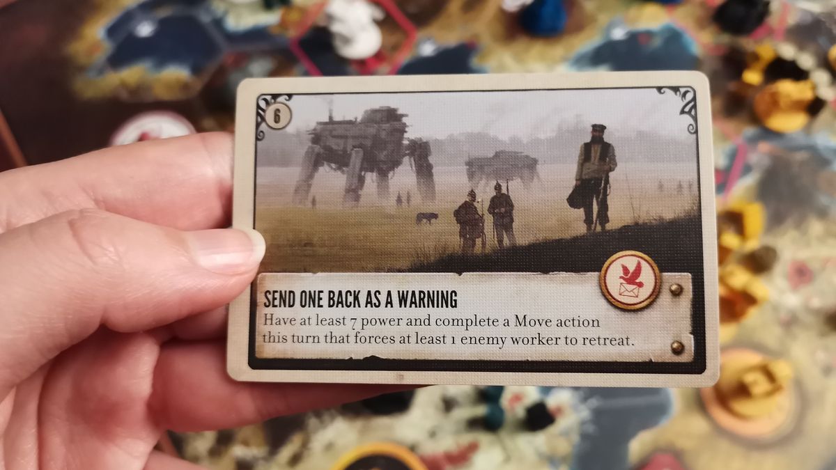 A hand holds a Scythe card reading 'send one back as a warning'